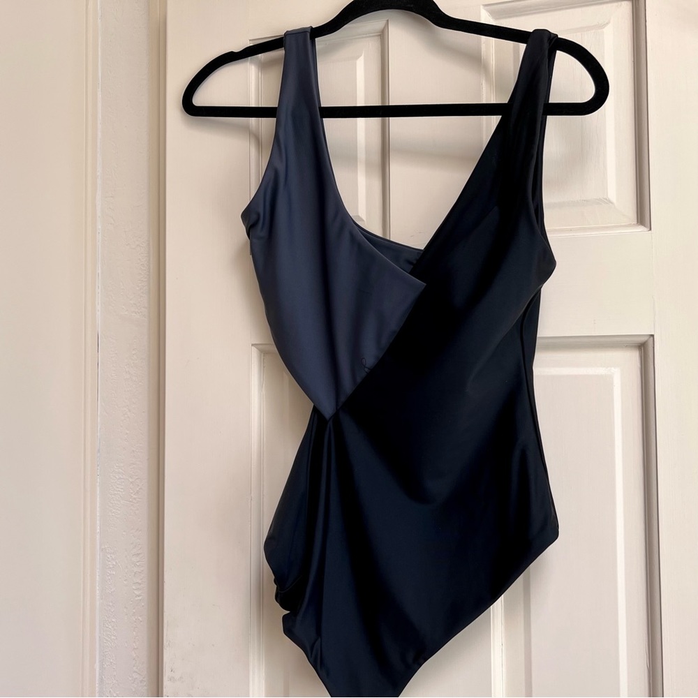 One piece swimsuit, NWOT, side opening,two tone black & grey.